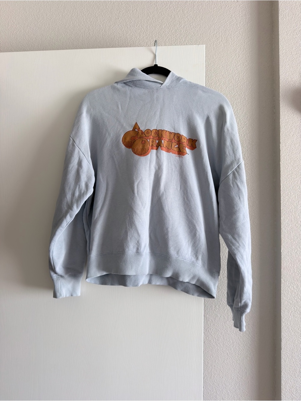 Snidel Light Blue Pullover Hoodie with Orange Logo